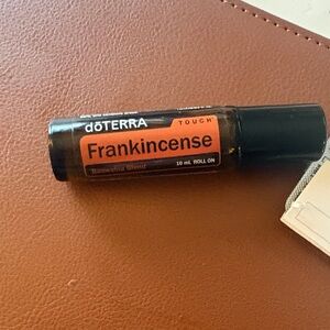 Doterra Frankincense Roll-On with Orange Label and Black Cap